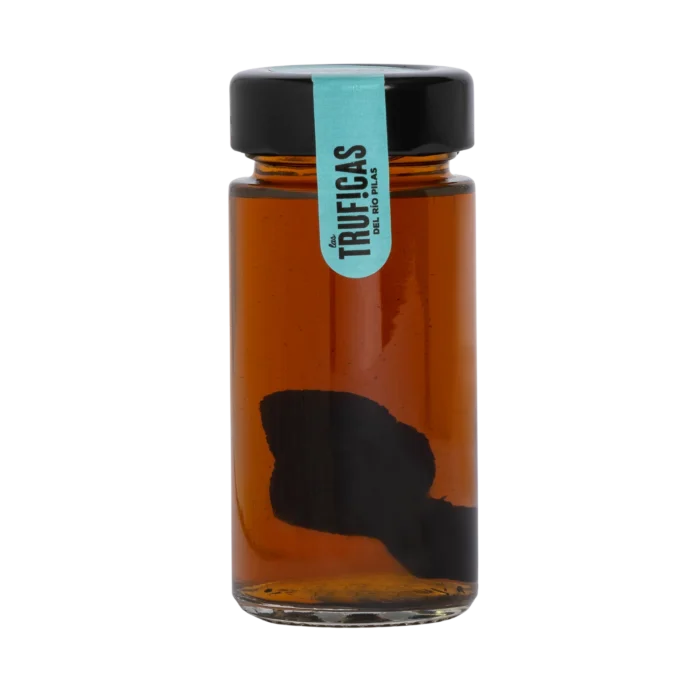 Trufa negra con brandy para cocinar Truficas en tarro de cristal con la trufa entera sumergida